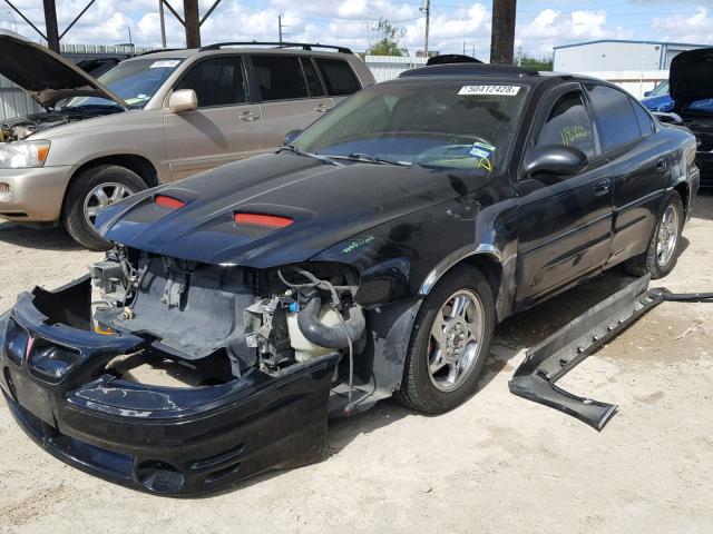 1G2NV52E42C320702 - 2002 PONTIAC GRAND AM G BLACK photo 2