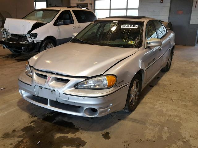 1G2NV52E71C151340 - 2001 PONTIAC GRAND AM G SILVER photo 2