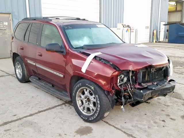 1GKDT13S922413218 - 2002 GMC ENVOY MAROON photo 1