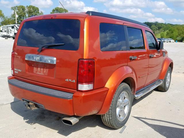 1D8GU58K97W550408 - 2007 DODGE NITRO SLT ORANGE photo 4