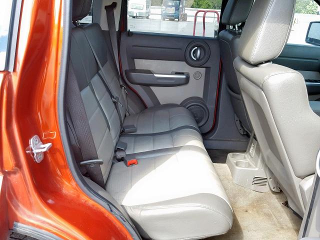 1D8GU58K97W550408 - 2007 DODGE NITRO SLT ORANGE photo 6