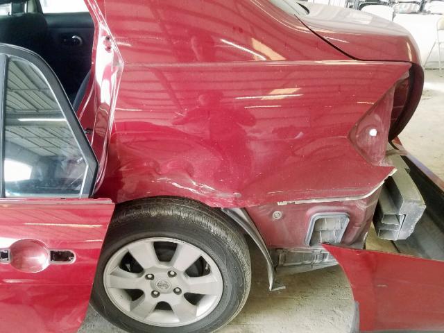 3N1BC11E39L370684 - 2009 NISSAN VERSA S RED photo 9