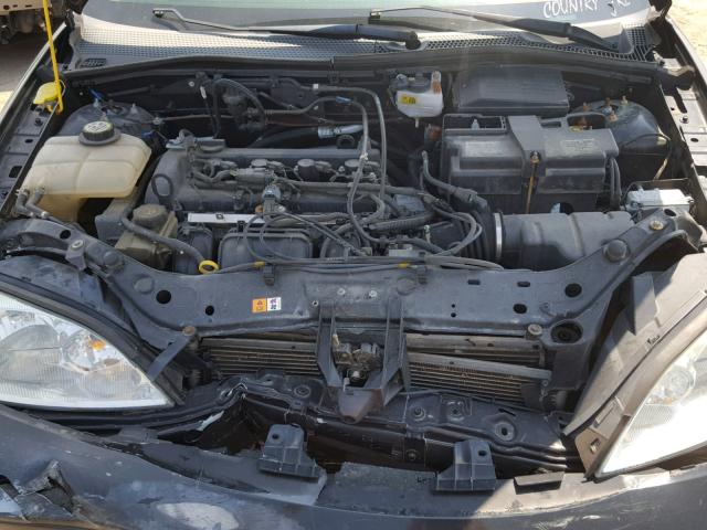 1FAHP37N37W210705 - 2007 FORD FOCUS ZX5 BLACK photo 7