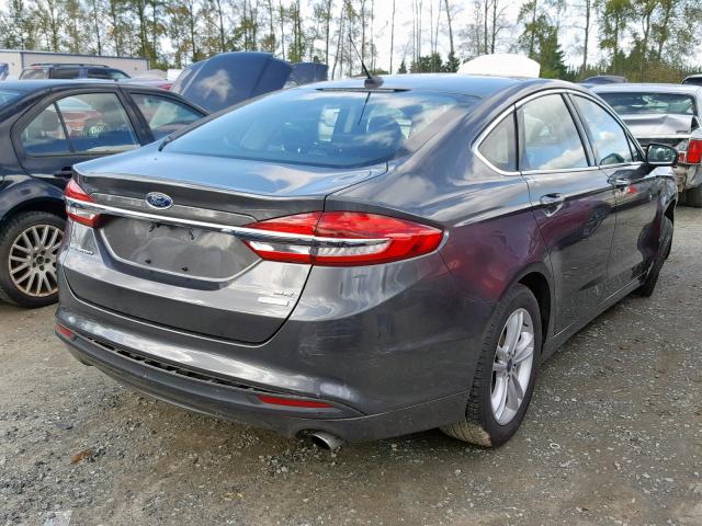 3FA6P0HD7JR271268 - 2018 FORD FUSION SE BLUE photo 4