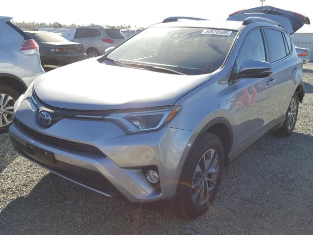 JTMRJREV2JD183943 - 2018 TOYOTA RAV4 HV LE SILVER photo 2