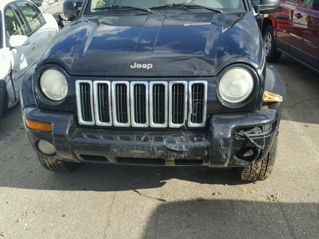 1J4GL58K52W231138 - 2002 JEEP LIBERTY LI BLACK photo 9