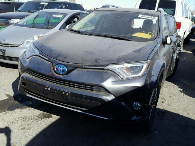 JTMRJREV4JD157232 - 2018 TOYOTA RAV4 HV LE BLACK photo 2