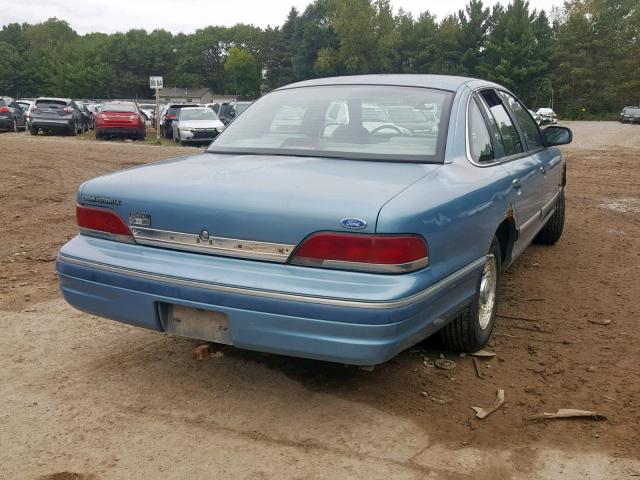 2FACP74WXPX115318 - 1993 FORD CROWN VICT BLUE photo 4