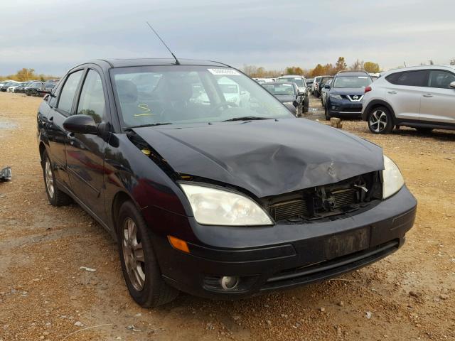 1FAHP38Z56W133190 - 2006 FORD FOCUS ZX4 BLACK photo 1