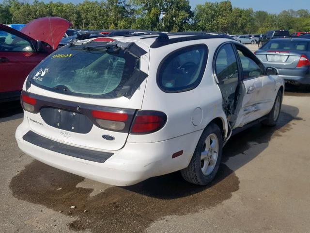 1FAFP58SX1G160104 - 2001 FORD TAURUS SE WHITE photo 4