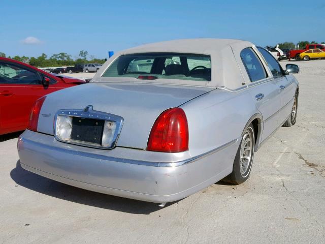 1LNHM83W8YY796804 - 2000 LINCOLN TOWN CAR C SILVER photo 4