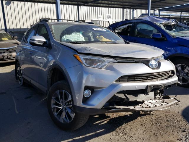 JTMRJREV8JD169447 - 2018 TOYOTA RAV4 HV LE SILVER photo 1