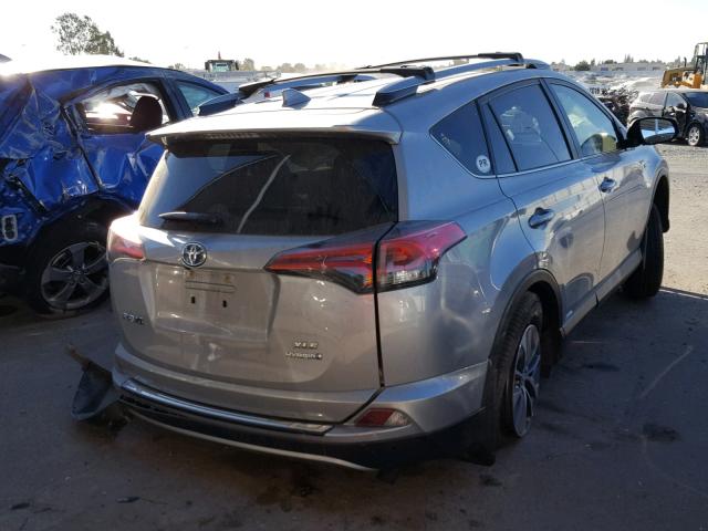 JTMRJREV8JD169447 - 2018 TOYOTA RAV4 HV LE SILVER photo 4