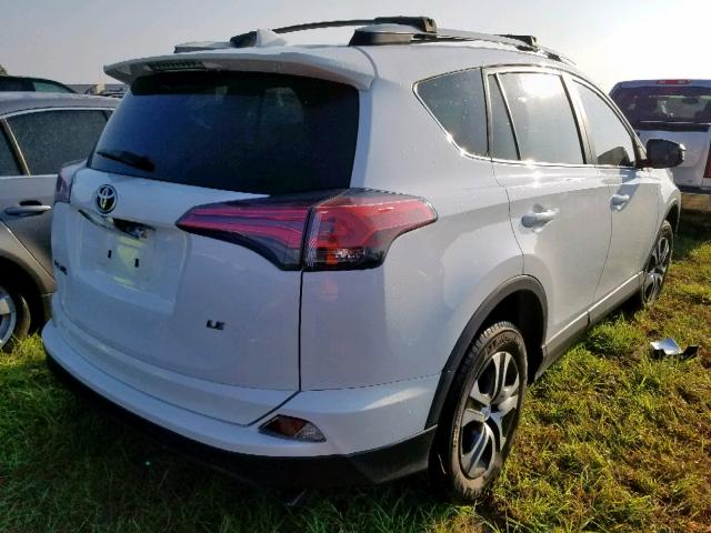 2T3ZFREV6HW330845 - 2017 TOYOTA RAV4 LE WHITE photo 4