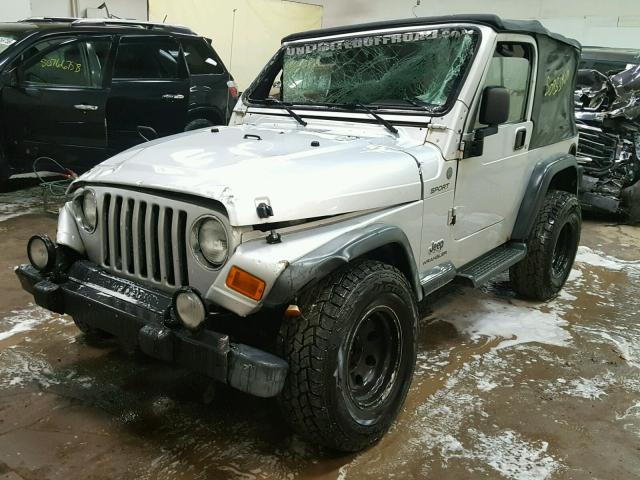 1J4FA49S14P746743 - 2004 JEEP WRANGLER / SILVER photo 2