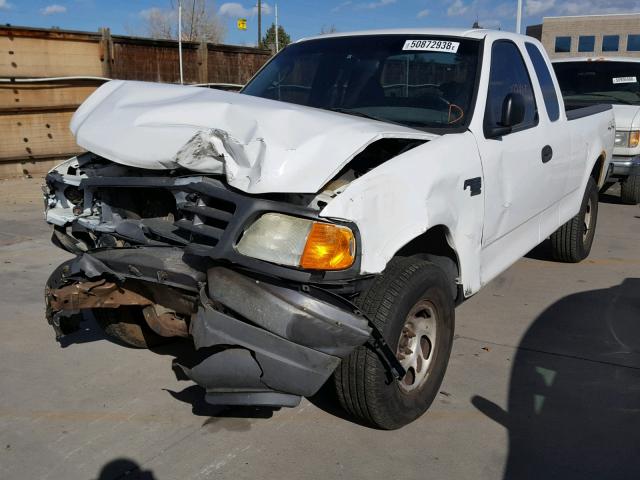 2FTRX18W04CA16005 - 2004 FORD F-150 HERI WHITE photo 9