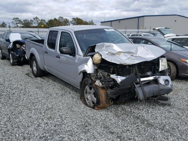 1N6AD09U17C403683 - 2007 NISSAN FRONTIER C SILVER photo 1