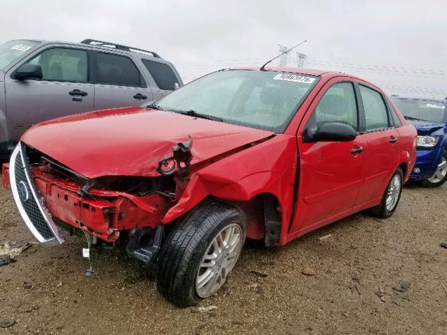 1FAFP34N05W289856 - 2005 FORD FOCUS ZX4 RED photo 2