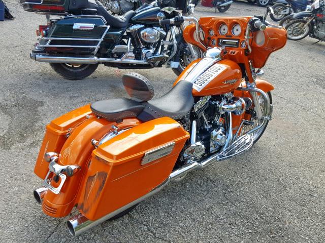 1HD1KB41XAB648351 - 2010 HARLEY-DAVIDSON FLHX ORANGE photo 4