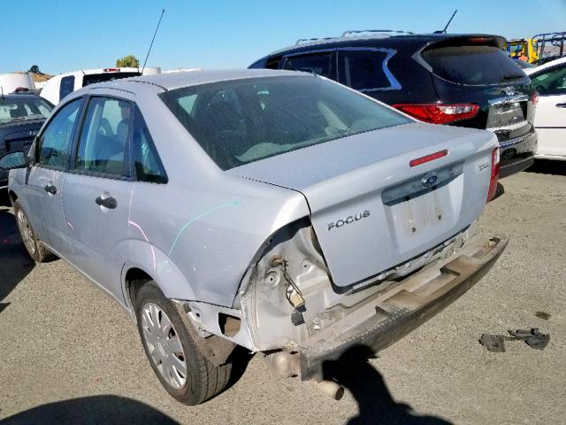 1FAFP34N55W160706 - 2005 FORD FOCUS ZX4 SILVER photo 3