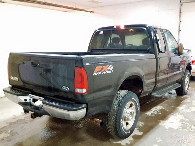 1FTWX31P75EA58636 - 2005 FORD F350 SRW S BLACK photo 4