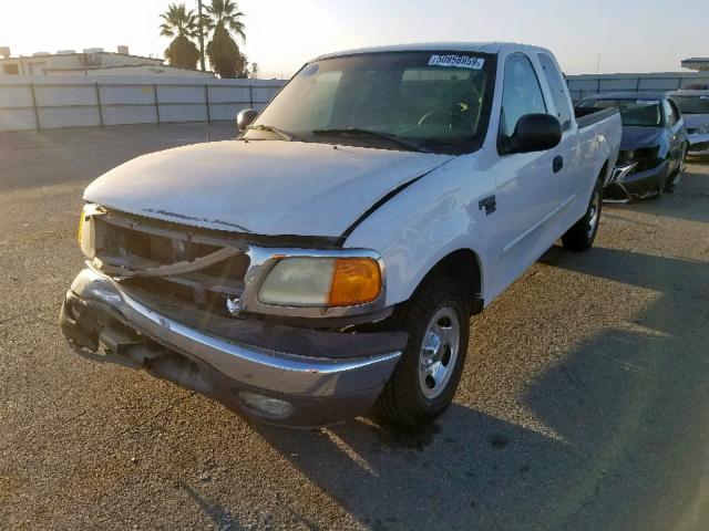 2FTRX17W74CA77157 - 2004 FORD F-150 HERI WHITE photo 2