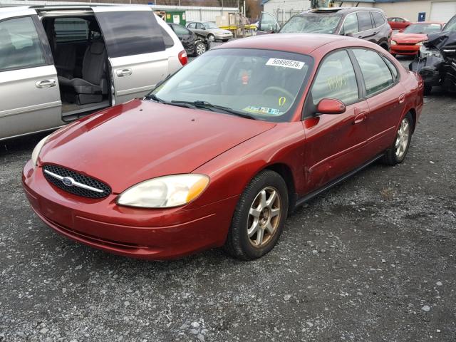 1FAFP5529YA141044 - 2000 FORD TAURUS SES RED photo 2