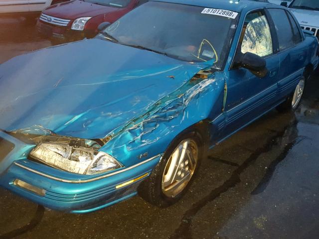 1G2NE55M7RC750995 - 1994 PONTIAC GRAND AM S BLUE photo 10