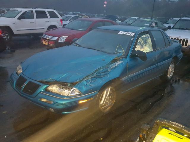 1G2NE55M7RC750995 - 1994 PONTIAC GRAND AM S BLUE photo 2