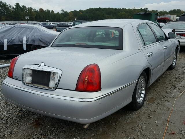 1LNHM83W71Y647953 - 2001 LINCOLN TOWN CAR C SILVER photo 4