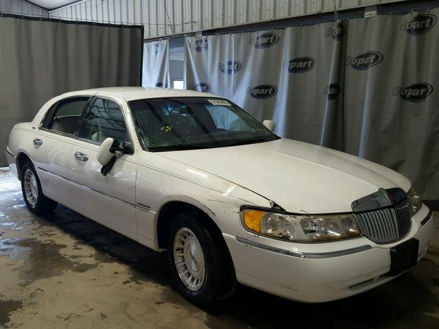 1LNHM81W8XY669620 - 1999 LINCOLN TOWN CAR E WHITE photo 1