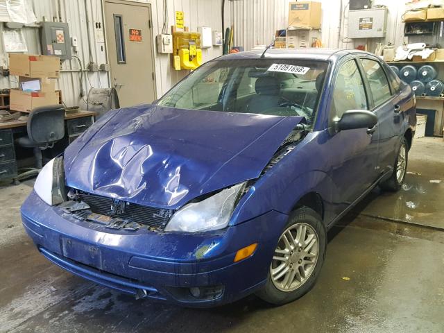 1FAFP34N95W270531 - 2005 FORD FOCUS ZX4 BLUE photo 2