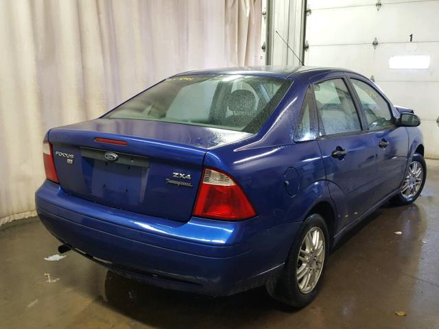 1FAFP34N95W270531 - 2005 FORD FOCUS ZX4 BLUE photo 4