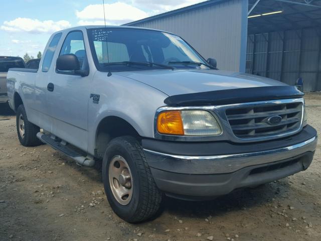 2FTRX18W34CA40041 - 2004 FORD F-150 HERI SILVER photo 1