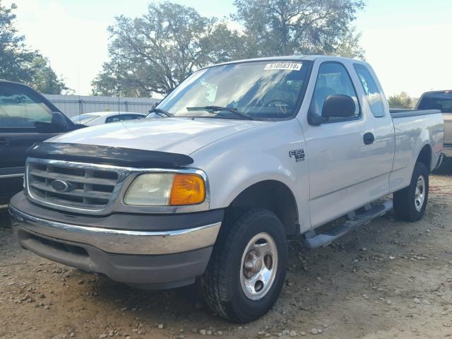 2FTRX18W34CA40041 - 2004 FORD F-150 HERI SILVER photo 2