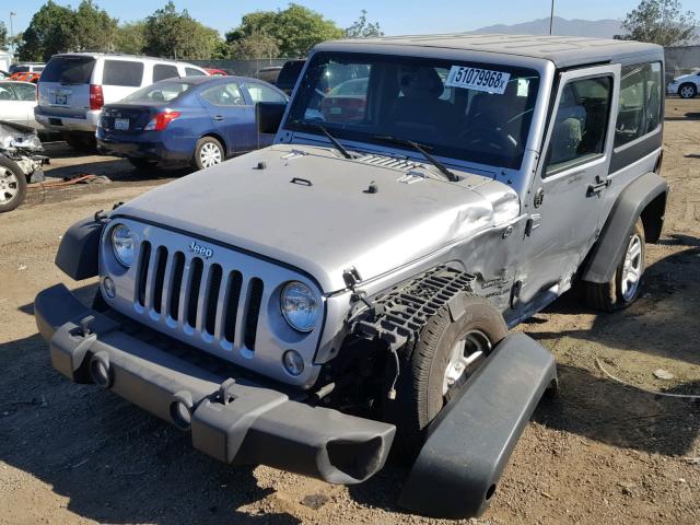 1C4AJWAG5FL735497 - 2015 JEEP WRANGLER S SILVER photo 2