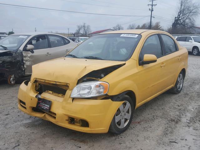 KL1TD5DE6BB137074 - 2011 CHEVROLET AVEO LS YELLOW photo 2