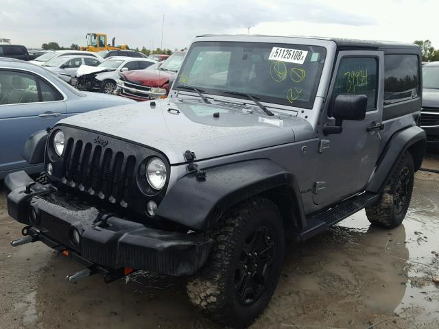 1C4AJWAG0GL140039 - 2016 JEEP WRANGLER S SILVER photo 2