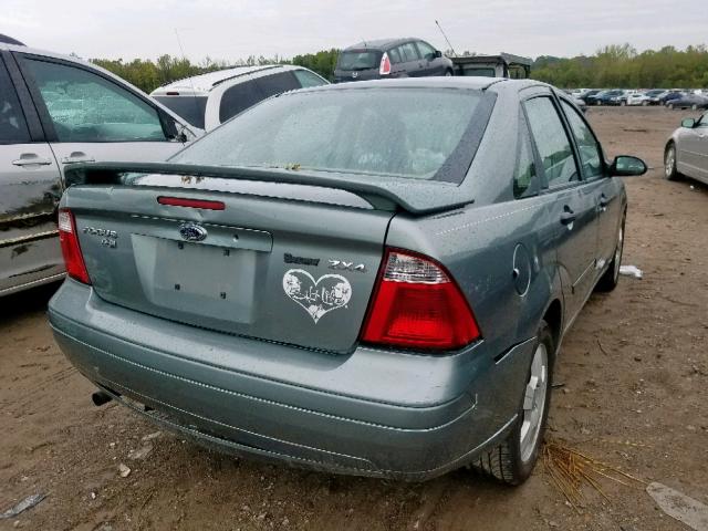 1FAHP34N86W186209 - 2006 FORD FOCUS ZX4 SILVER photo 4