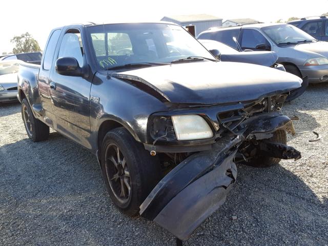 1FTRX07232KB81659 - 2002 FORD F150 BLACK photo 1