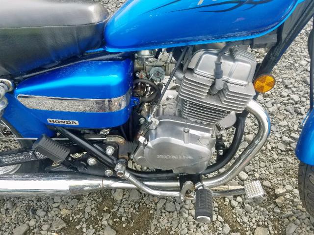 JH2MC13009K507435 - 2009 HONDA CMX250 C BLUE photo 7