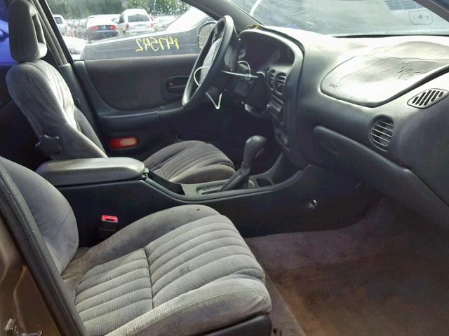 1G2WR5216XF234349 - 1999 PONTIAC GRAND PRIX GOLD photo 5