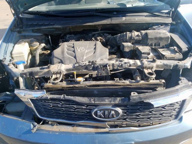 KNDMG4C71C6418646 - 2012 KIA SEDONA LX BLUE photo 7