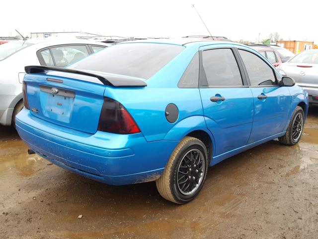 1FAFP34N67W198304 - 2007 FORD FOCUS ZX4 BLUE photo 4