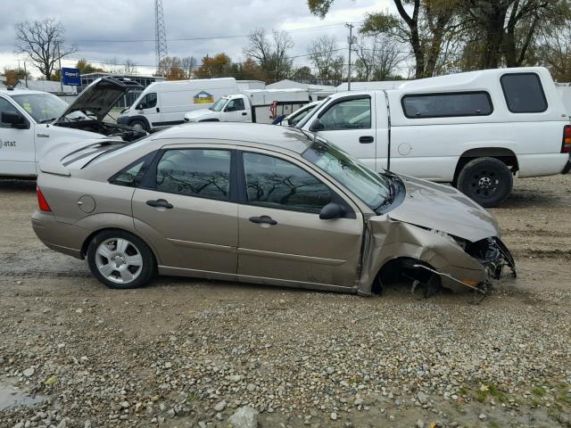 1FAHP34N25W240604 - 2005 FORD FOCUS ZX4 TAN photo 9