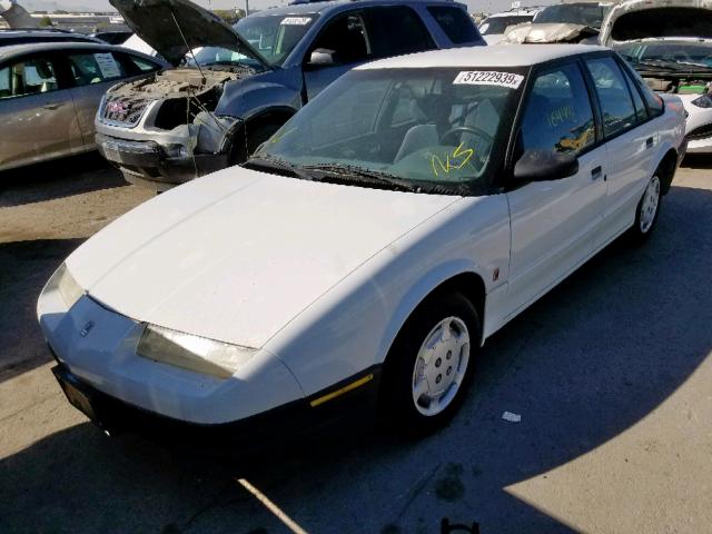 1G8ZG5497NZ266797 - 1992 SATURN SL1 WHITE photo 2