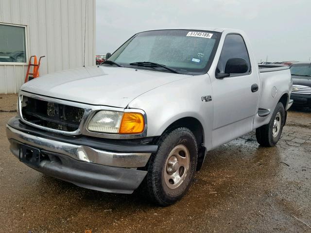 2FTRF07294CA20212 - 2004 FORD F-150 HERI SILVER photo 2