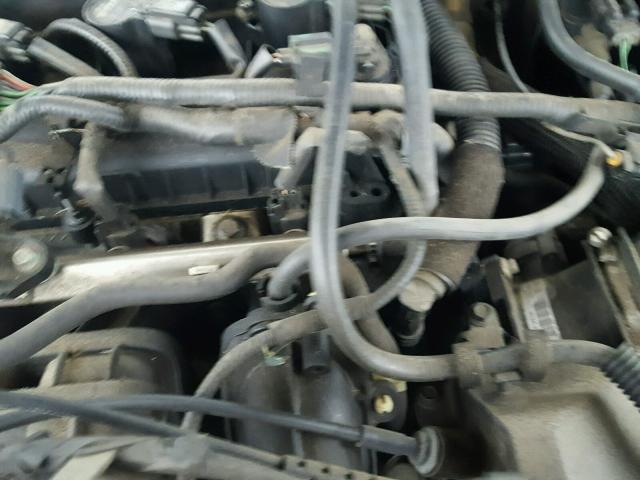 1FAFP34N45W241602 - 2005 FORD FOCUS ZX4 GRAY photo 7