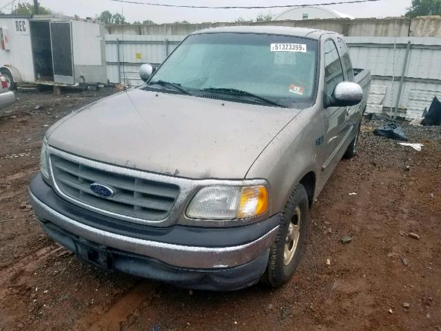 1FTZX17211NB88824 - 2001 FORD F150 GOLD photo 2