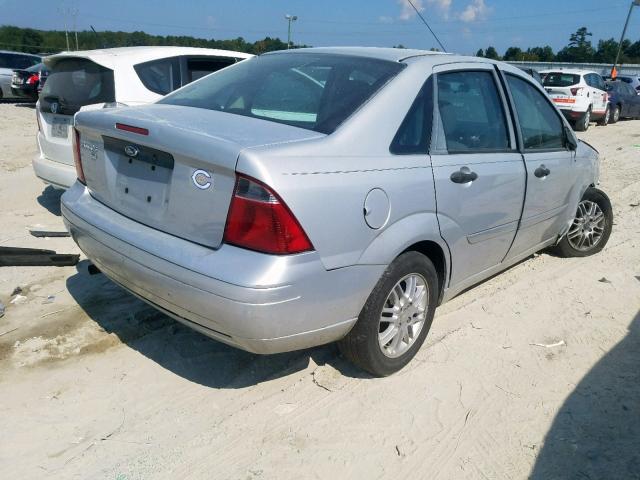 1FAFP34N37W319757 - 2007 FORD FOCUS ZX4 GRAY photo 4